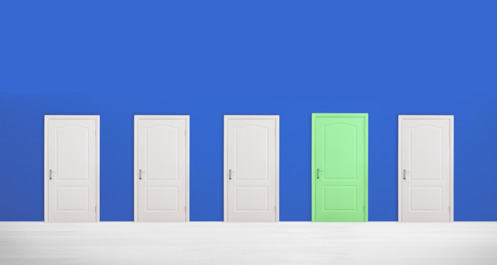 A row of five doors against a cobalt blue background. All of the doors are white except for t6he fourth one, which is green.